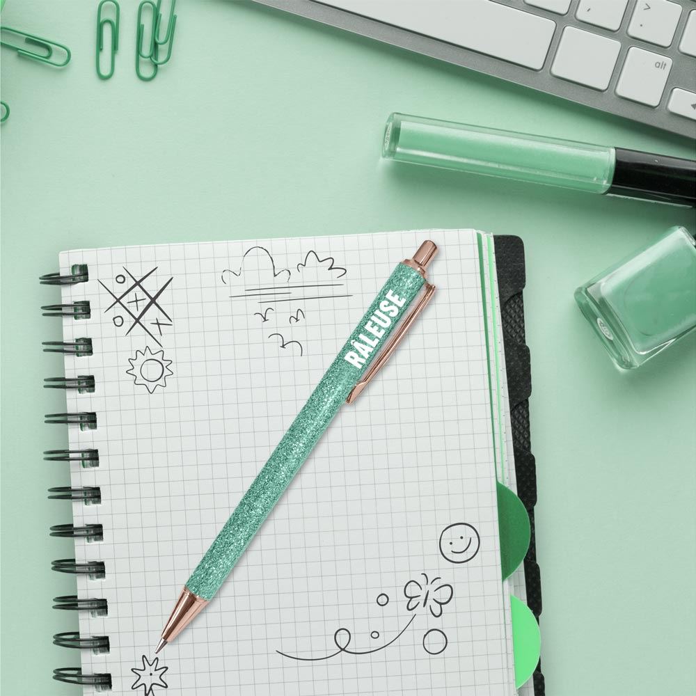 Stylo a paillettes turquoise raleuse