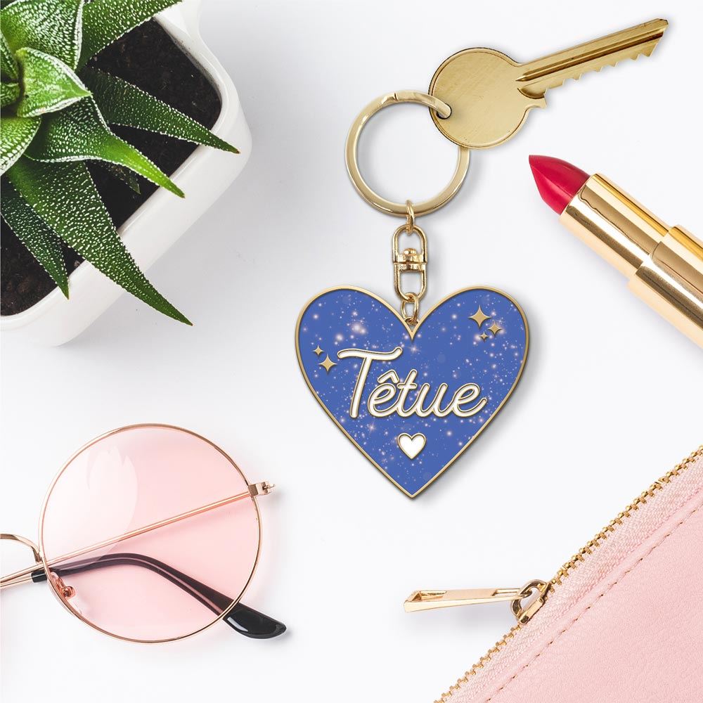 Porte cles paillettes tetue
