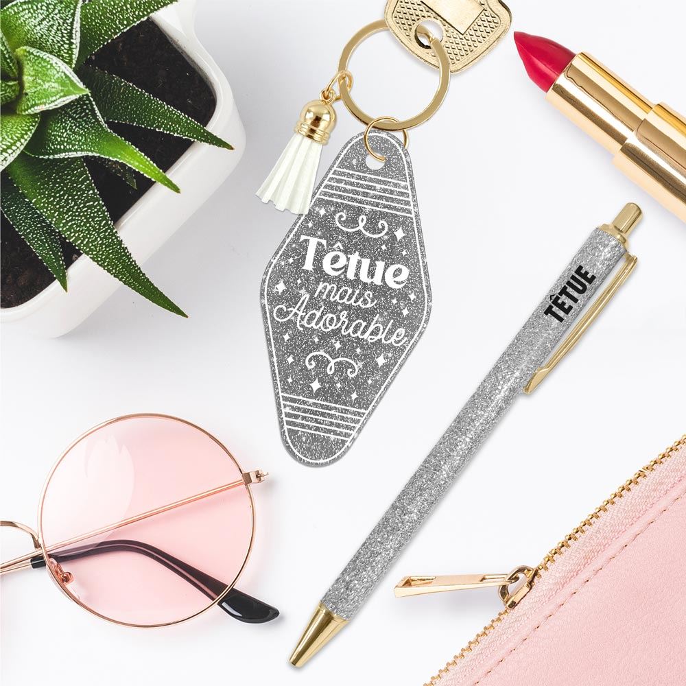 Duo paillettes porte cles motel et stylo tetue

