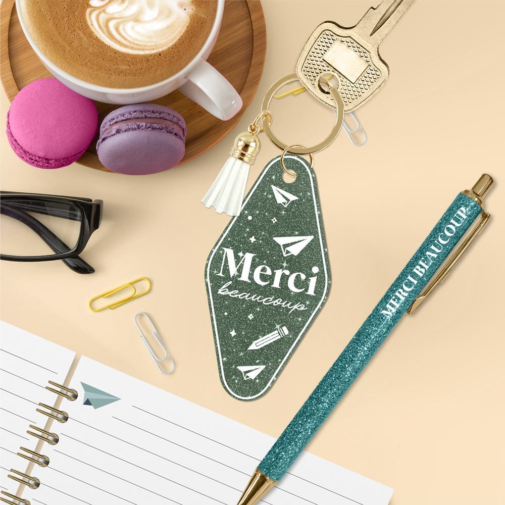 Duo paillettes porte-cles motel et stylo merci beaucoup
